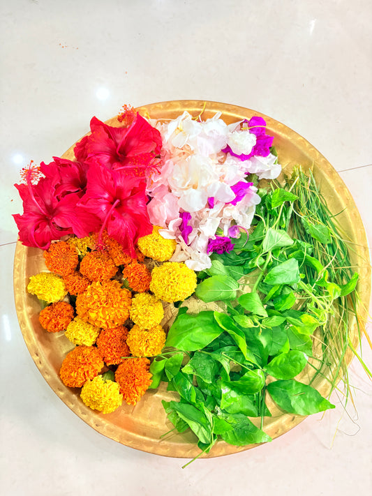 Puja Thali(Red Hibiscus, Marigolds (Yellow/Orange), White/Purple Crepe Jasmine/Oleander, Bel Leaves, Durva Grass)