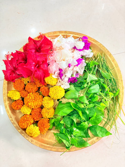 Puja Thali(Red Hibiscus, Marigolds (Yellow/Orange), White/Purple Crepe Jasmine/Oleander, Bel Leaves, Durva Grass)
